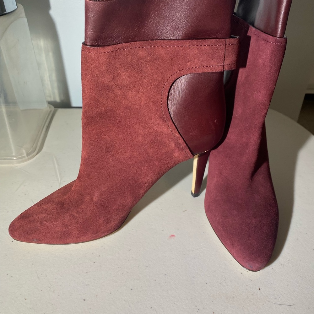 Jimmy Choo burgundy suede and leather ankle boots.